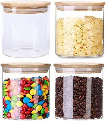 China Heatable 4 Pack Glass Storage Jars with Sealed Bamboo Lids Clear Glass Bulk Food Storage Canister for Serving Tea Coffee Spice for sale