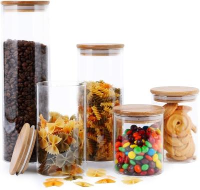 China Heatable 5 Pack Glass Kitchen Canister Set, Clear Glass Food Storage Jars with Airtight Bamboo Wooden Lid For Flour, Sugar, Candy, Cookie for sale