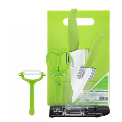 China Stocked 6pcs Ceramic Kitchen Chef Knife Peeler Scissors with Knife Block Cutting Board for sale