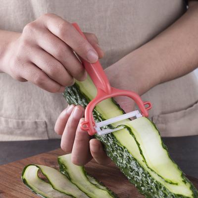 Chine Peigne de cuisine en céramique à poignée bleue MIDDIA lame blanche pour pommes de terre et légumes à vendre