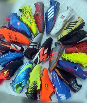 China Mixed Cheap Football Shoe Mixed Cheap Outdoors Man Stock Cushioning For Kids for sale