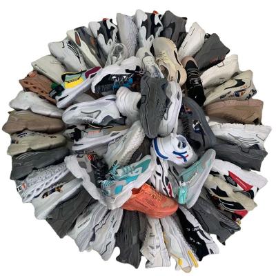 China Quality Wholesale Mixed Stock Guarantee Foreign Trade Cheap Low Price Sports Shoes Inventory Damping for sale