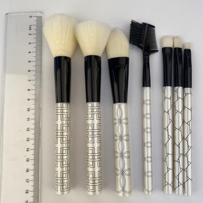 China Angular Blush Makeup Brush Set 7pcs Grid Pattern Design White Handle Makeup Brush Set Professional Wood For Beauty for sale