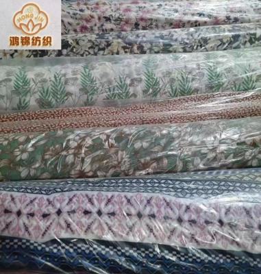 China 100% Organic Polyester Pearl Chiffon Pearl Stock Fabric Cheap Price Good Quality for sale