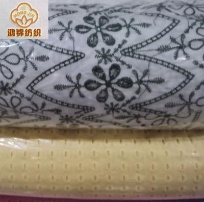 China 100% organic cotton hot-wholesale full embroidery for garment stock fabric for sale