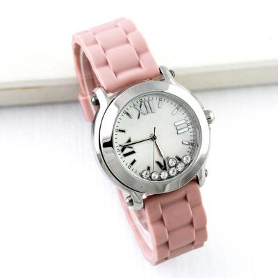 China Day/Date Jewelry Accessories Lady Watch Luxury Design With Movable Stone Pink Rubber Band Women Watch OEM ODM for sale