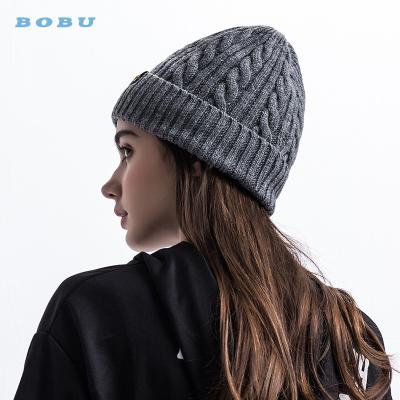 China JOINT Custom Women Fashion Winter Knit Beanie Hat Fuzzy Hat for sale