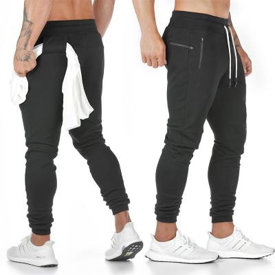 China Breathable Fashion Training Running Ankle Pants Gym Yoga Gaiters Waist Tops Harem Running Pants Fitness Sportswear For Men for sale