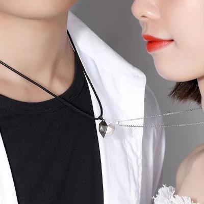 China FASHIONABLE Lovers Love Magnet Color Matching Necklace Contracted Creative Stone Heart Vows Clavicle Chain Splicing Pendant With Men And Women for sale