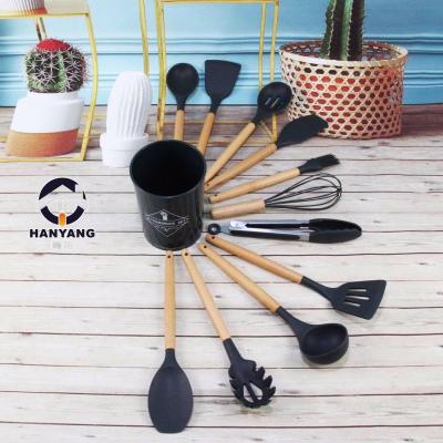 China Sustainable Wholesales Wooden Kitchen Utensil Set Silicon Cookware For Cooking for sale