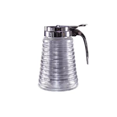 China Moisture Proof Glass Stocked Honey Dispenser With Metal Lid for sale