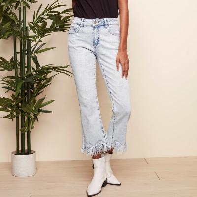 China Fashionable fringed edge everyday wear QUICK DRY long cropped denim bleach blue jeans for women italian jeans brands for sale