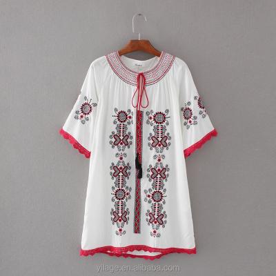 China Anti-pilling Wholesale Price Embroidered Flower Short Sleeve Rural Blouse With Tassel for sale