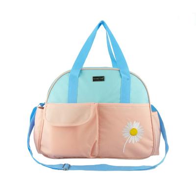 China Hot-selling Mummy One-Shoulder Embroidery Four-piece Multifunctional Morden Mother and Baby Supplies Storage Bag Oblique Cross Bag for sale