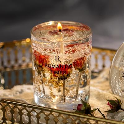 China 2022 Birthdays Luxury Natural Soy Crystal Scented Wax Custom Candle Infused Crystal Stone and Dry Flower Decorative Candles for sale