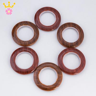 China Minimalist plastic wood grain curtain ring curtain fabric accessories for sale