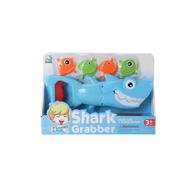 China ABS Plastic Shark Grabber Beach Toys 1 Shark With 4 Small Fish Teeth Biting Action Kids Grabber Toys for sale