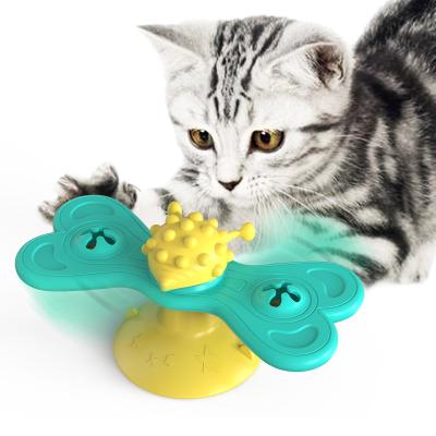 China Sustainable Hot Selling Eco-Friendly TPR Plastic Butterfly Windmill Cat Pet Spinning Teeth Cleaning Chewing Toy Pet Ball for sale