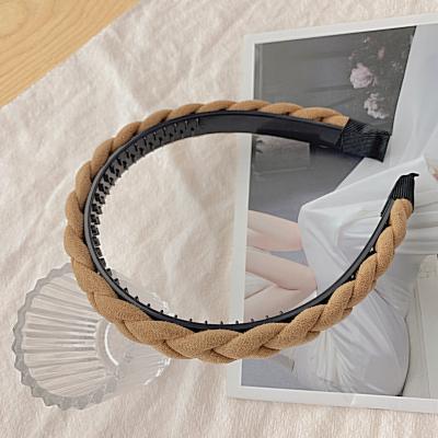 China Fashion Simple Solid Color Hair Bands Ladies Link Hair Bands Simple Twist Hair Bands Shape Knot Hair Accessories for sale