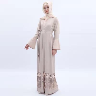 China Polyester 2021 custom factory plus size Arab clothing summer Muslim women's dress solid color tassel sequins direct sales for sale