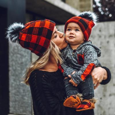 China RTS COMMON Warm Female Slouchy Hat 2021 Winter Custom Logo Pom Pom Beanie Red and Black Plaid Knitted Hat for Women and Kid for sale