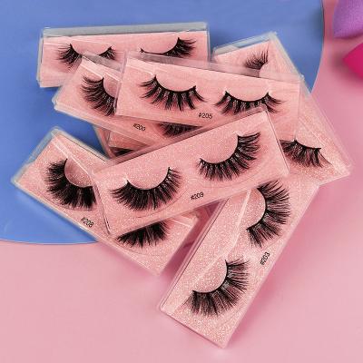 China Long natural dense exaggerated false 3D eyelashes imitating mink hair fitted eyelashes one pair of plastic box for sale