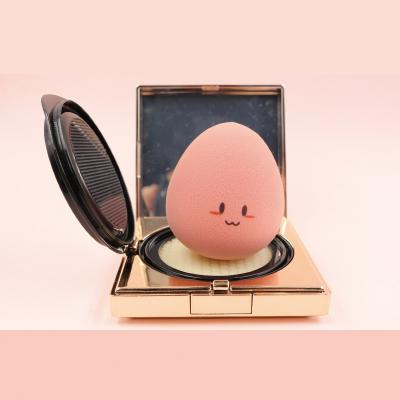 China 2021 New Washable Expandable Super Soft Latex Puff Free Cosmetic Makeup Sponge Egg With Cute Emotion Icon for sale