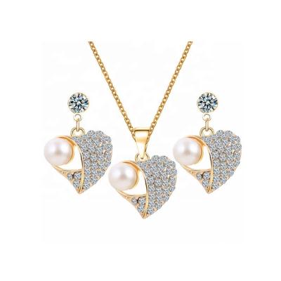 China Factory direct sale CLASSIC hot sale fashion style pearl rhinestone necklace and earring jewelry set directly for sale