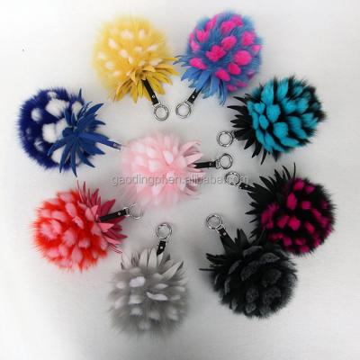 China Key chain selling beautiful fashionable pineapple flower fox fur ball fur pom pom key chain clothing handbags main part for sale