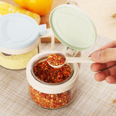 China Freshness Preservation Plastic Recycle Wheat Fiber Seasoning Storage Container Spice Glass Jar Set Air Tight Spices Powder Packaging Jars With Spoon for sale