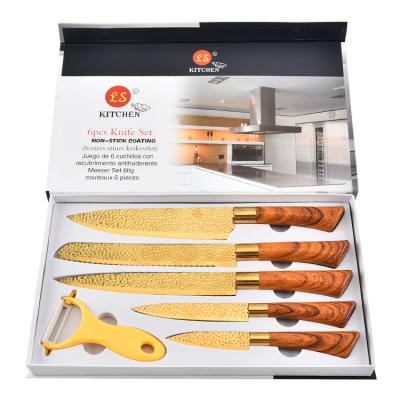 China Viable Professional Golden Hammer Blade Titanium Titanium Kitchen Knife With Wood Grain Handle for sale