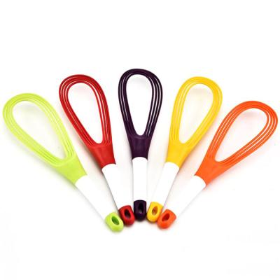 China Viable High Quality Silicone Egg Beater Food Grade Silicone Egg Beater Kitchen Accessories Tool for sale