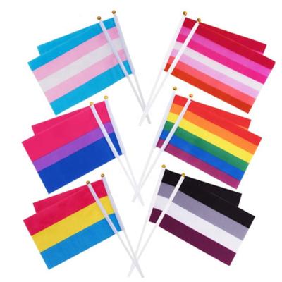 China Hot Selling Custom Decoration 14*21cm 100D Polyester LGBT Rainbow Hand Flag For Activities for sale