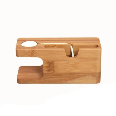 China PORTABLE 2 in 1 Watch and Cell Phone Bamboo Charging Stander People Lazy Wooden Charging Stand for sale