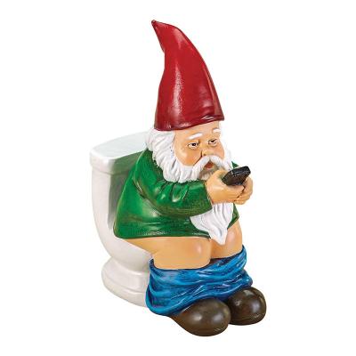 China Europe Toilet Handmade Funny Garden Gnome On The Throne Reading Telephone Garden Statue for sale