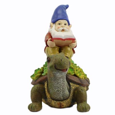 China Europe Resin Gnome Riding Turtle Statues Figurine With Resin Turtle Solar Led Light Decoration for sale