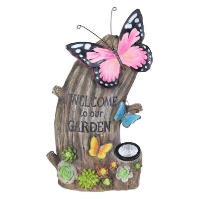 China Europe Hand Painted Resin Made Welcome Tree Stump Statue With Butterflies Succulents Resin Garden Decor for sale