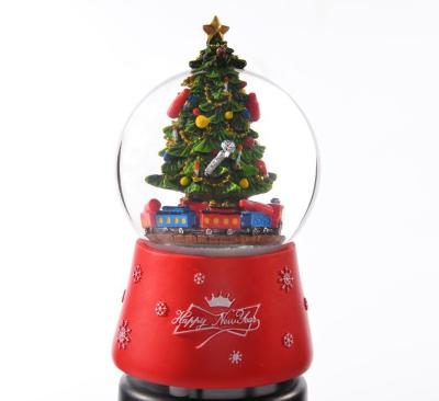 China Custom Europe Christmas Snow Globe With Music Snow Globe With Snow Blowing Sale for sale