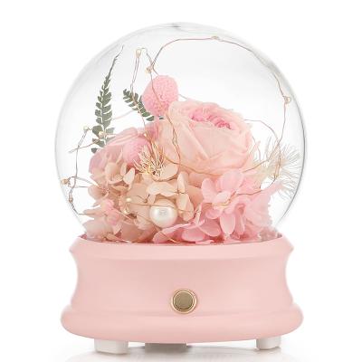 China Factory direct sales bluetooth glass cover immortal flower player preserved flower bluetooth player with atmosphere light rose 12.5*16.6cm for sale