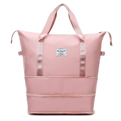 China Durable Custom logo travel pink duffel foldable bag dry wet separated waterproof sport gym bags with shoes compartment for sale