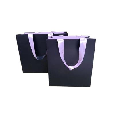 China Custom Made Cosmetic Packaging Product Hot Selling High Quality White 170g Card Logo Black Gift Bags for sale