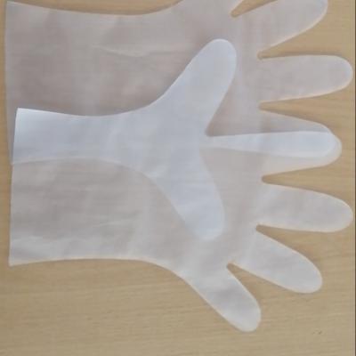 China Direct Good Hand Feeling Soft Elastomer Factory Sale Tape Disposable Gloves PE Gloves for sale