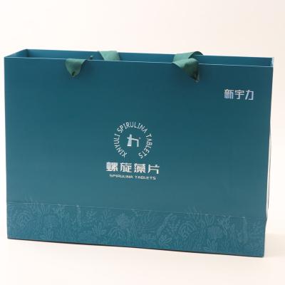 China Recycled Materials Eco Friendly Cardboard Custom Size Recyclable Newest Design Popular Embossing Gold Foil Stamping Craft Gift Luxury Paper Bag for sale