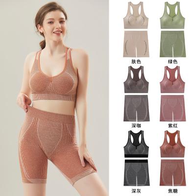 China Hot Sale Breathable Sweat Absorbent Sports Shockproof Elastic Seamless Bra Top And Shorts Sets for sale