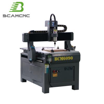 China Hotels BCAM 4axis 600*900mm CNC Cutting Machine 3D 6090 CNC Milling Router with Cast Iron Machine Bed for sale