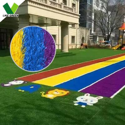 China Cartoon Pattern Premium Yellow Red Carpet Grass Kids Playground Lawn Grass Artificial Turf Custom Design for sale