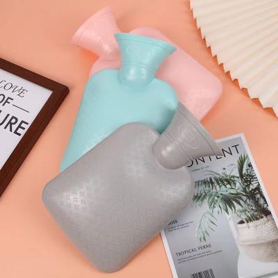 China Soft Environment Friendly Silicone Hot Water Bottle Mini For Travel And Pain Relief for sale