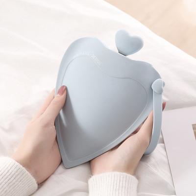 China Love Small Hot Water Bottle With Knited Cover Silicone Hot Water Bag For Pain Relief Waist Back Neck Menstrual Cramps for sale