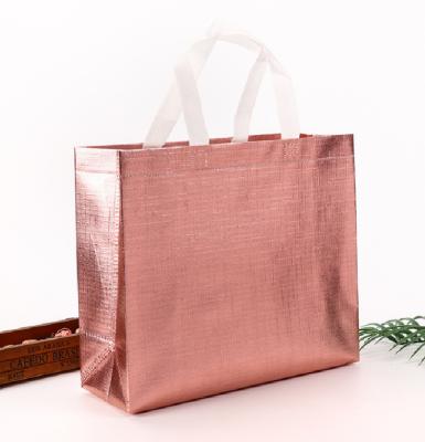 China Recyclable Rose Gold Laminated Large Non Woven Bag Shopping Tote Bag For Dress for sale