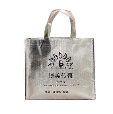 China Recyclable Custom Silver Shiny Laminated Non Woven Sack Garment Packaging Bag for sale